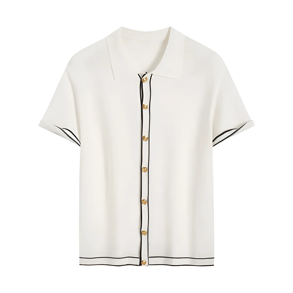 White women's short sleeve cardigan with dark contrast colour lapels on a hanger.
