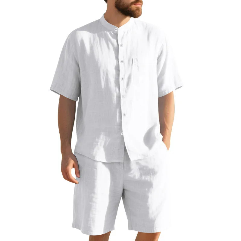 Men's light blue short sleeve linen shirt and shorts two-piece casual suit set on a hanger.