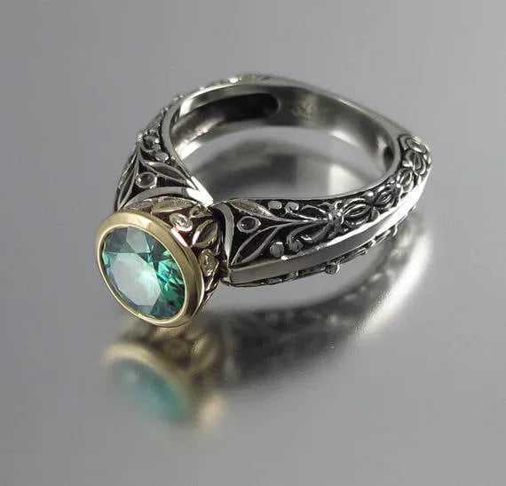 Women's gold-plated flower-shaped ring with green silver vintage gemstone.