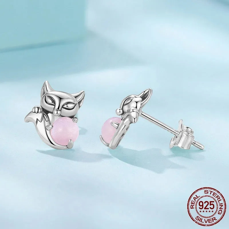 S925 sterling silver fox stud earrings with green jade inlay on white background
