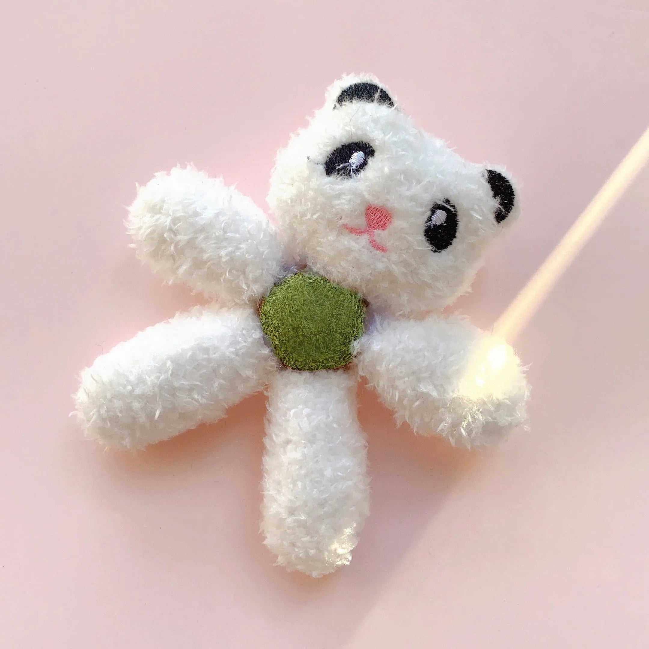 Catnip chewing ball with edible stuffing for dental cleaning in animal designs