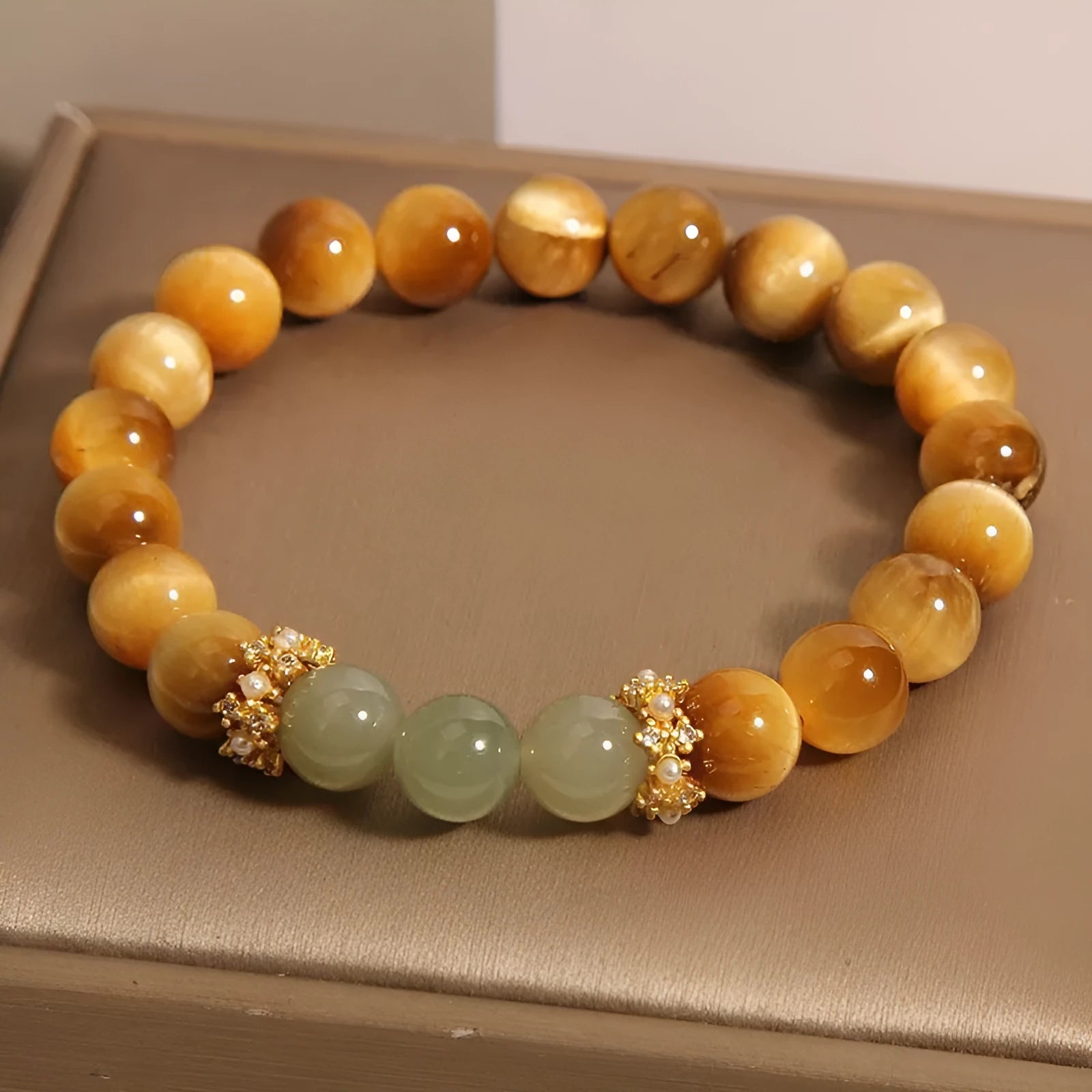 Natural yellow tiger's eye Hetian jade bracelet with U-shaped design and diamond treatment