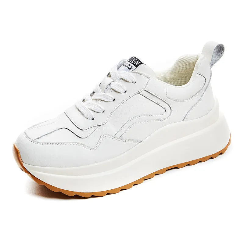 Beige women's leather casual sports shoes with low top, round toe, lace-up closure, and cross strap detail