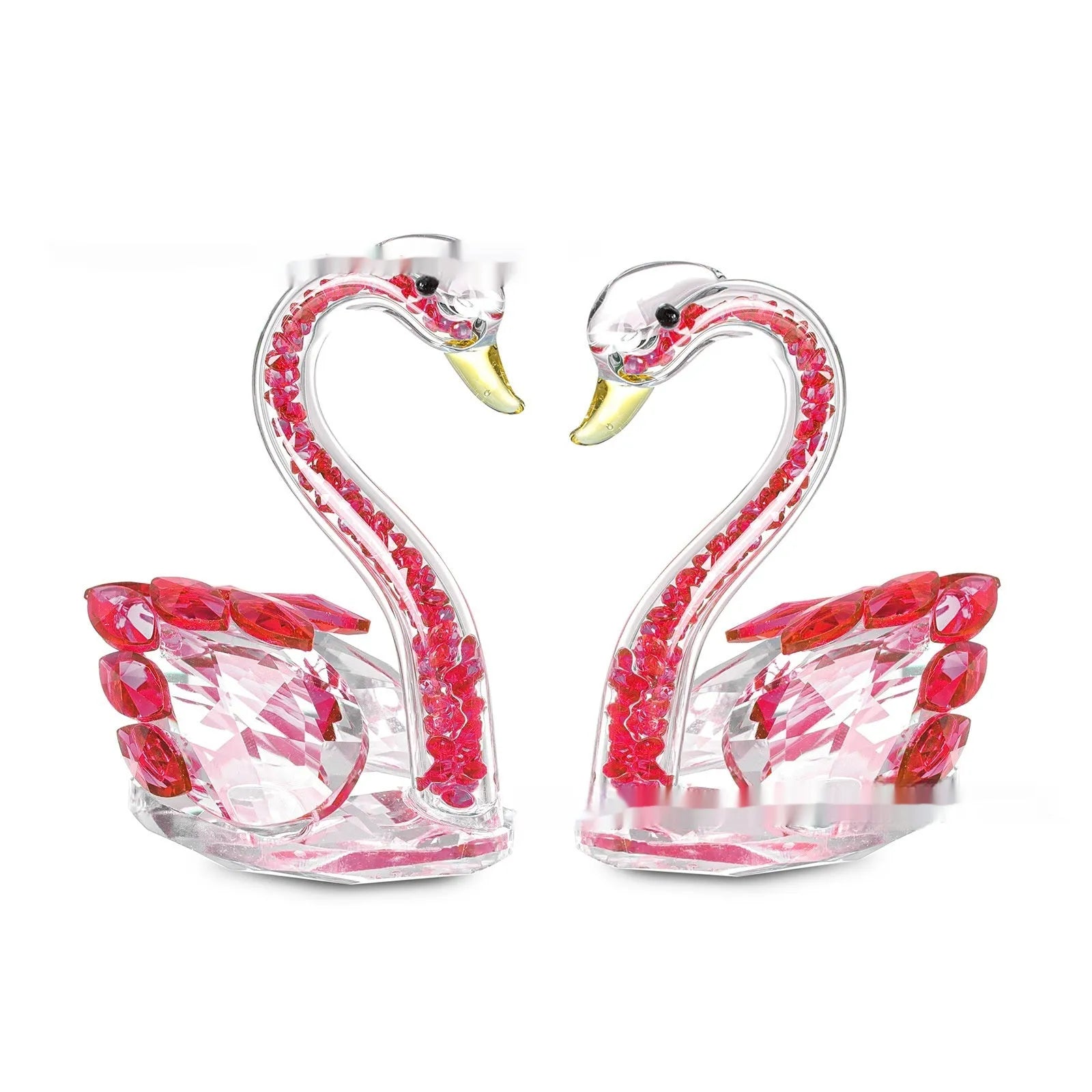 White crystal swan ornament on a desktop, shown in solid head and empty tube styles in red, blue, pink, and purple.