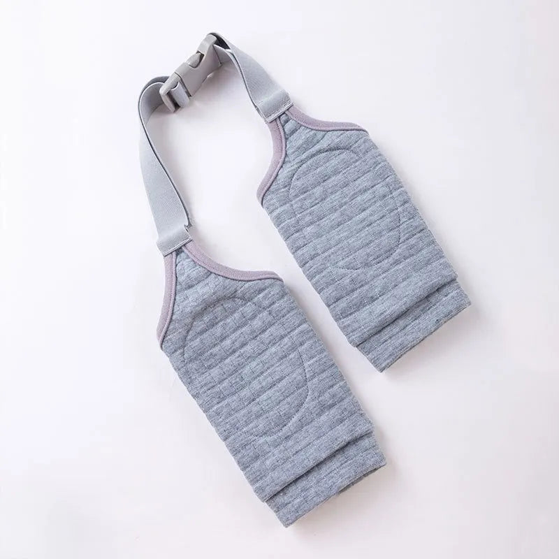 Blue dog knee brace with elbow padding and matching scarf shown on medium-sized dog