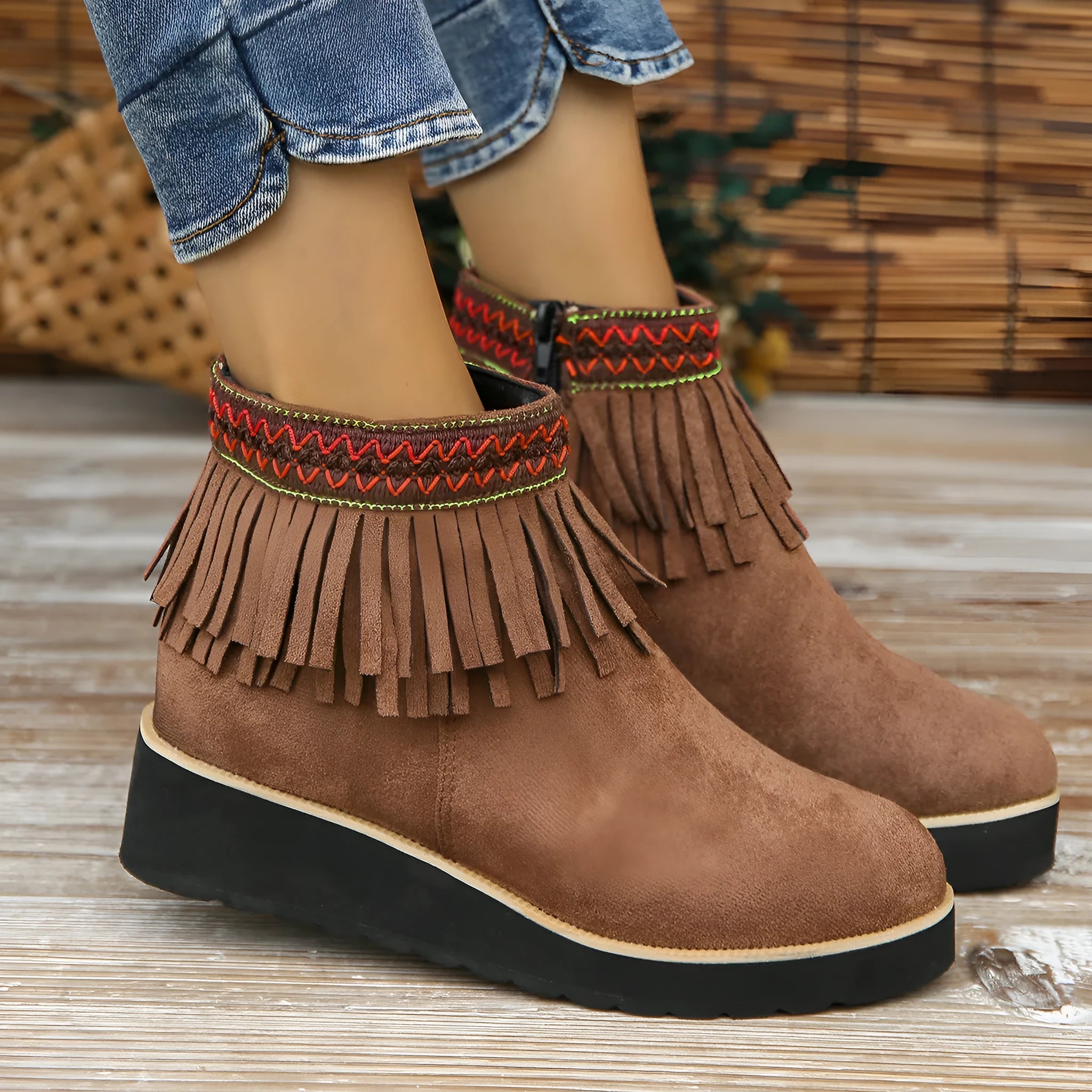 Women's black suede wedge boots with a side zipper and thick platform sole