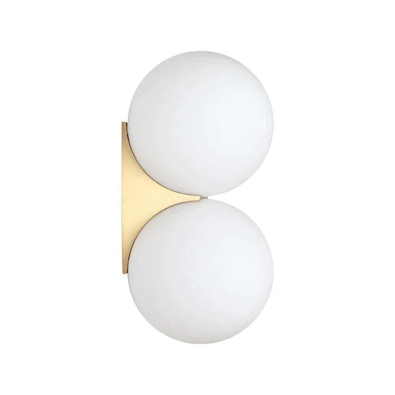 Nordic double-headed gold wall lamp with glass ball shade for bedroom bedside