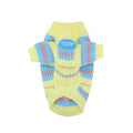 Blue and yellow striped wool sweater on a small dog, showing casual style for autumn