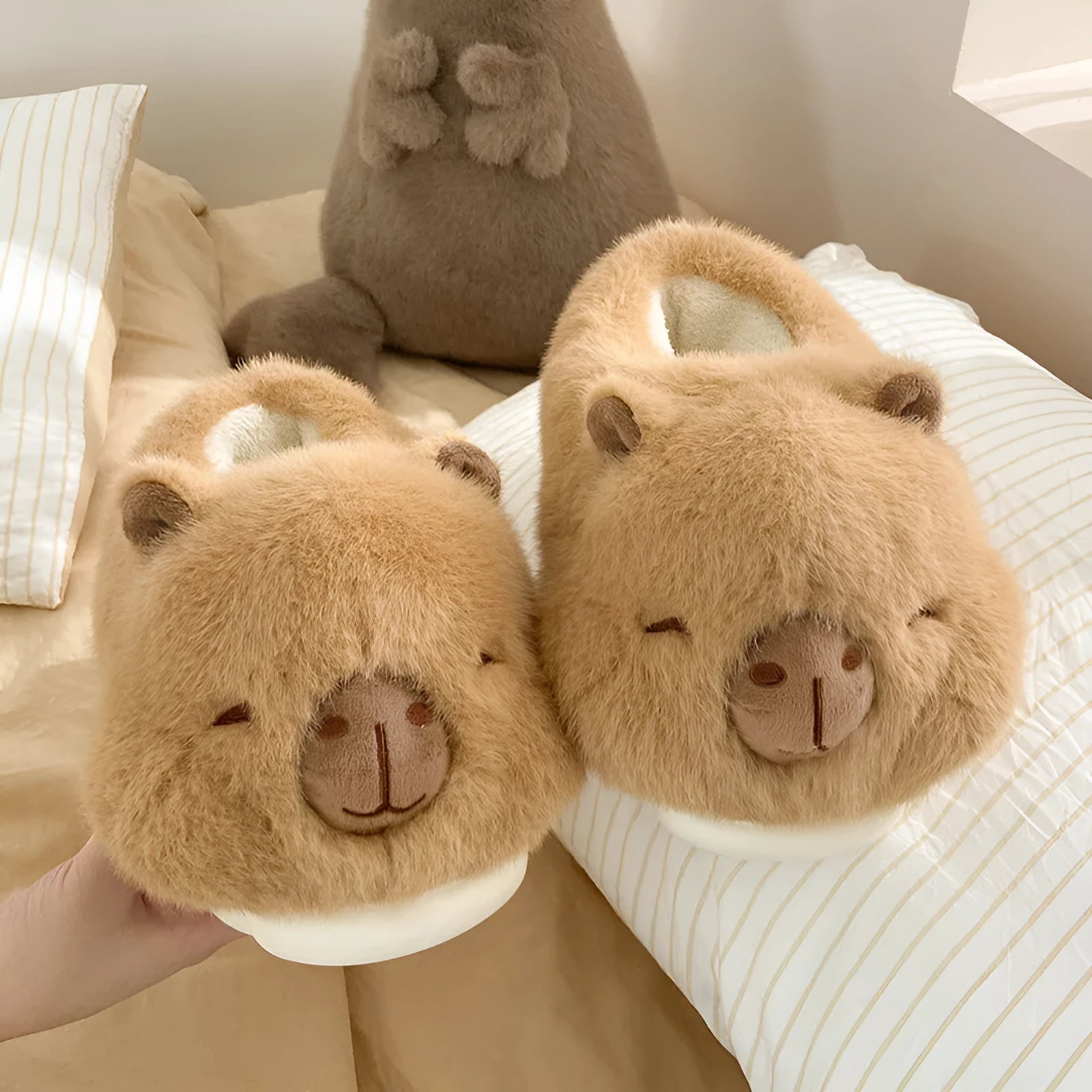 Light brown women's winter slippers with plush upper, artificial wool lining, and PVC sewn soles