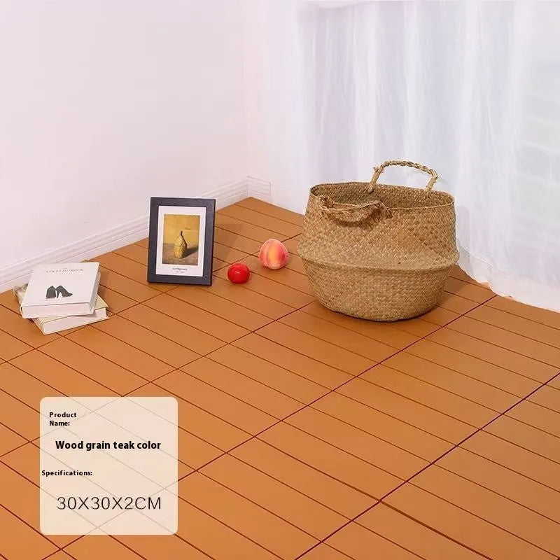 Wood grain plastic floor tiles showing splicing design and non-slip surface texture
