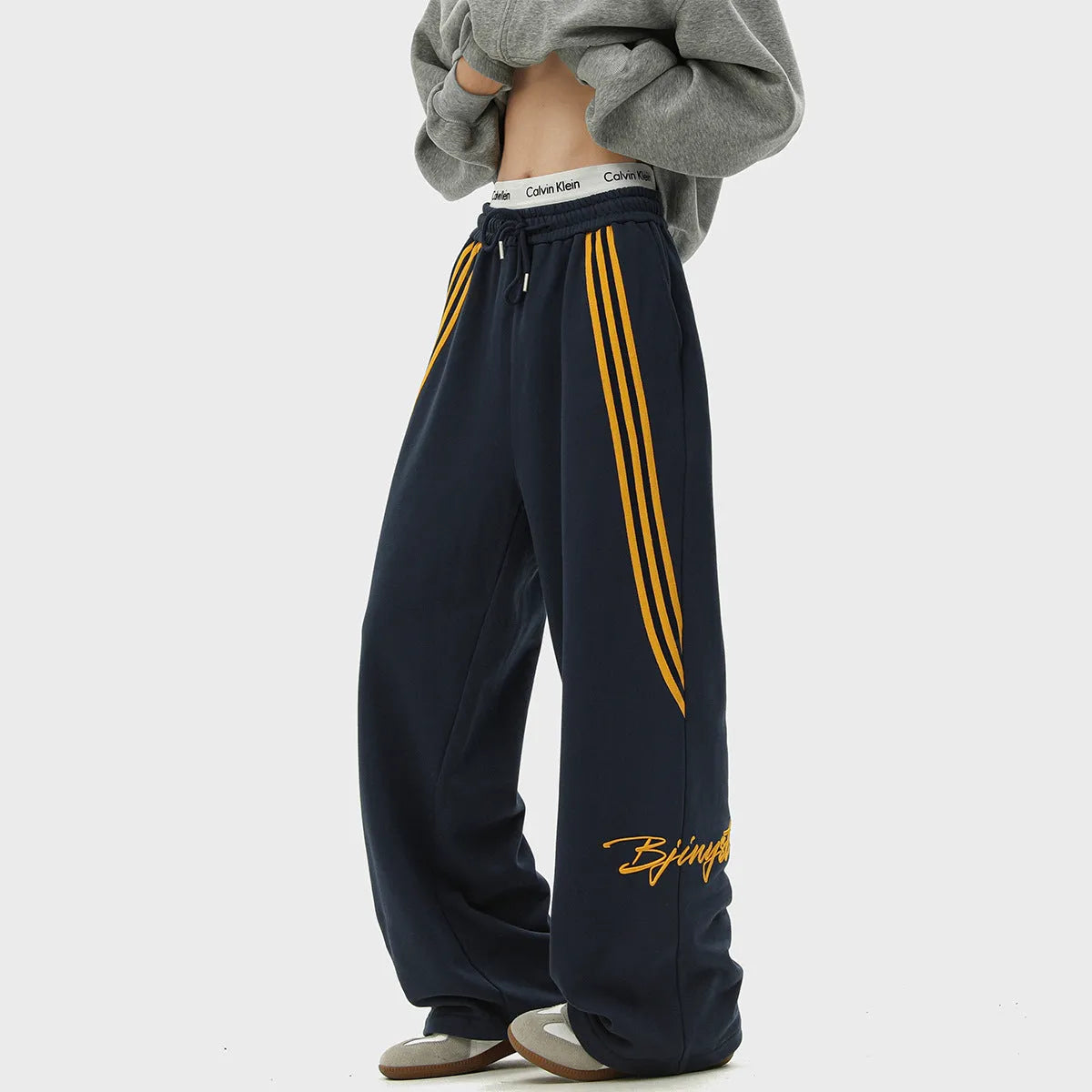 Trendy Brand striped men's loose straight-leg casual pants in Navy Blue, polyester stretch fabric, wrinkle-free finish