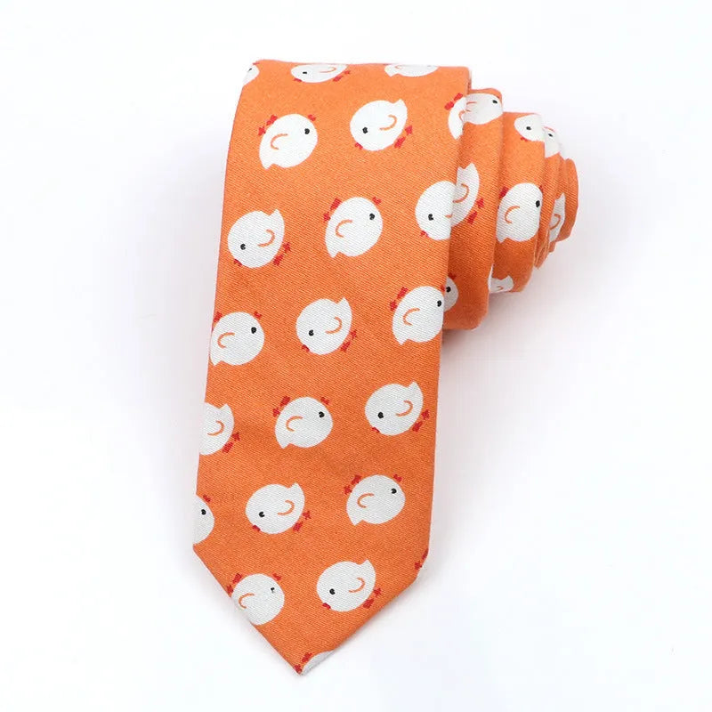 Men's narrow cotton bow tie in a cartoon print with an adjustable knot, shown in a selection of colours.