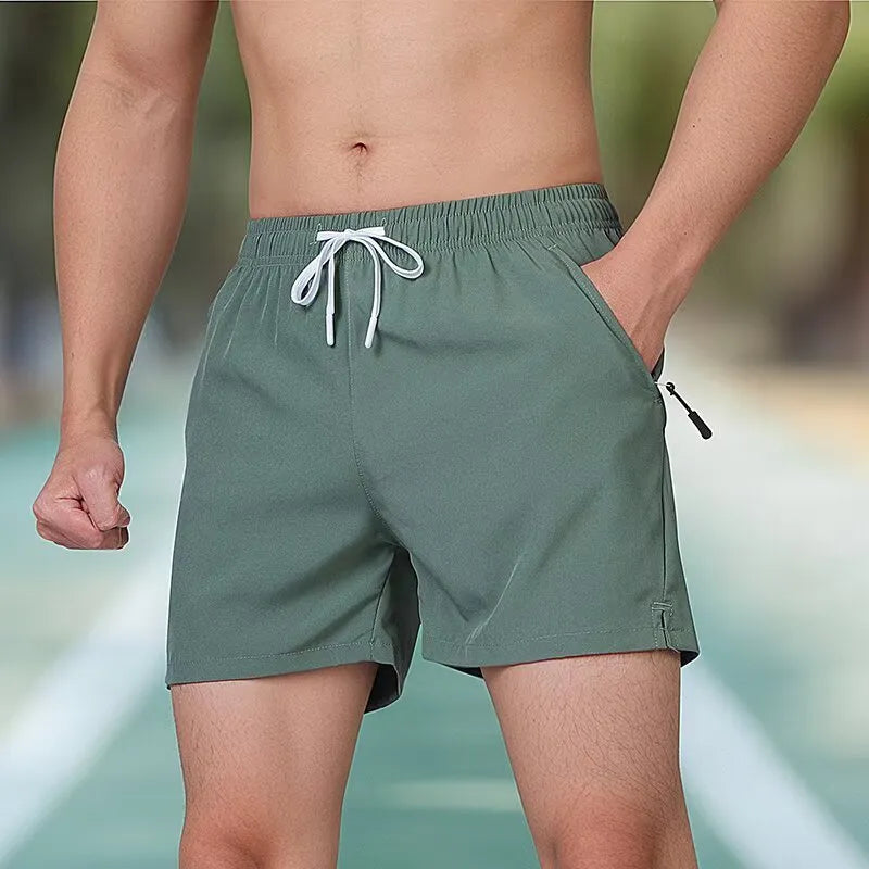 Men's black polyester fitness shorts with high waist design for running and training