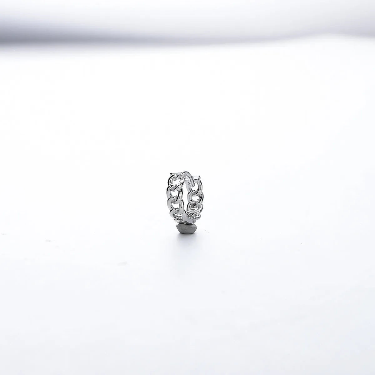 West Coast men's geometric copper hip hop earrings in silver, showing 10mm and 14mm sizes.