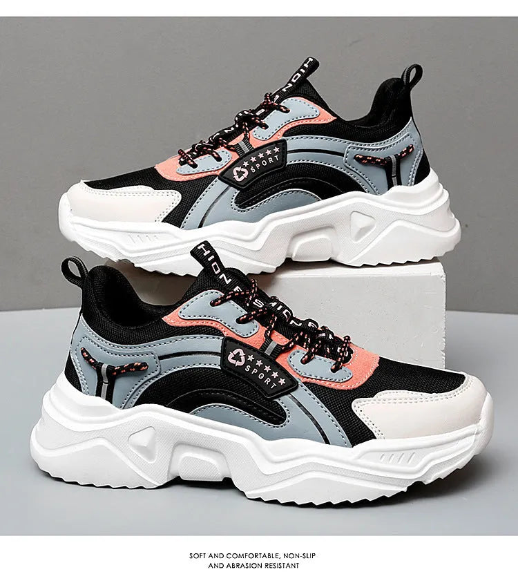 Women's white mesh casual sports shoes with thick PU sole, buckle detail, and a middle heel.