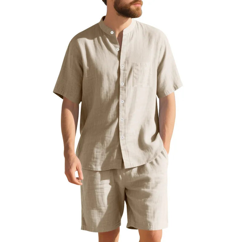 Men's light blue short sleeve linen shirt and shorts two-piece casual suit set on a hanger.