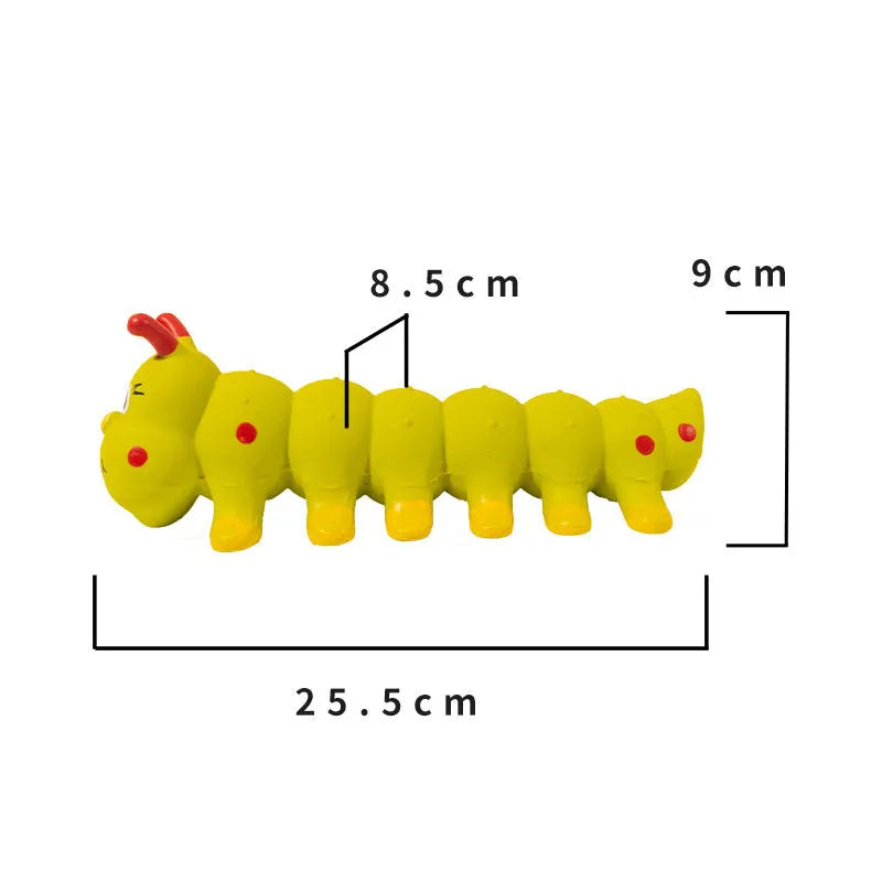 Yellow caterpillar-shaped rubber dog squeaky chew toy on a white background.