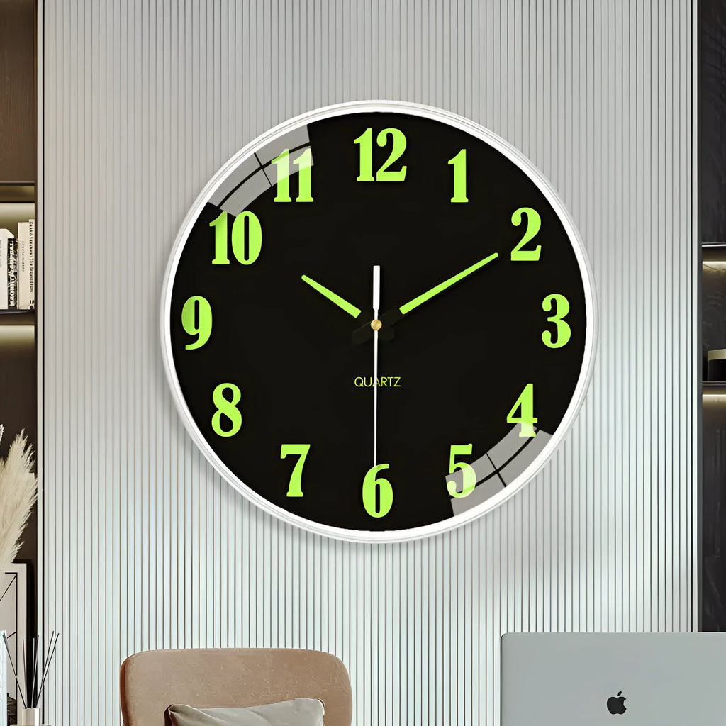 Modern 8-inch luminous wall clock with white dial on a plastic shell, mounted on a wall.