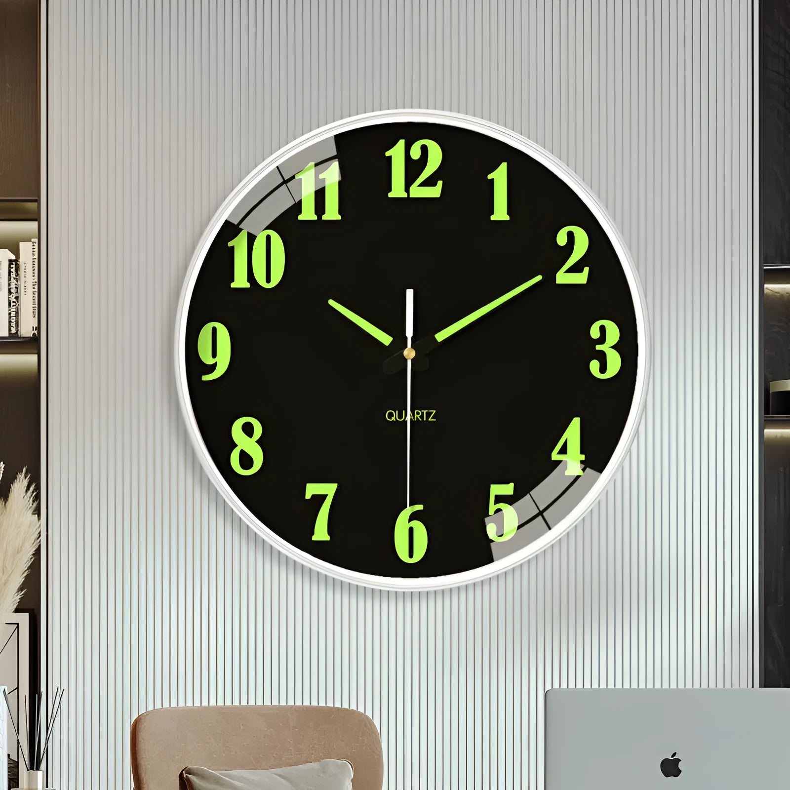 Modern 8-inch luminous wall clock with white dial on a plastic shell, mounted on a wall.