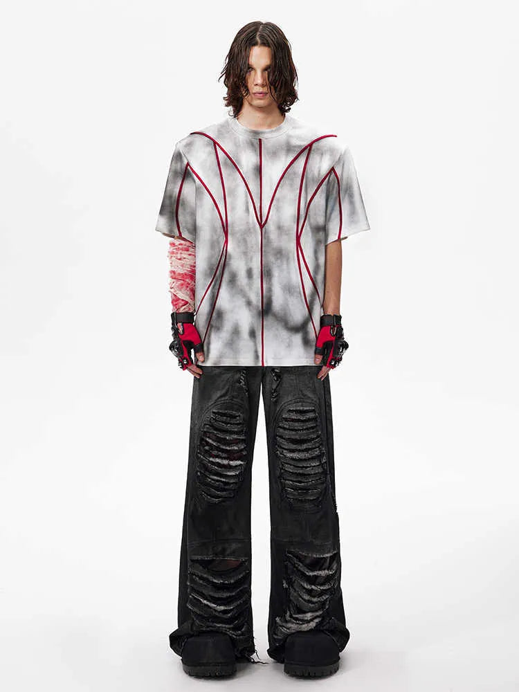 Short sleeve t-shirt with padded shoulders and raised line patchwork design on a round neck.
