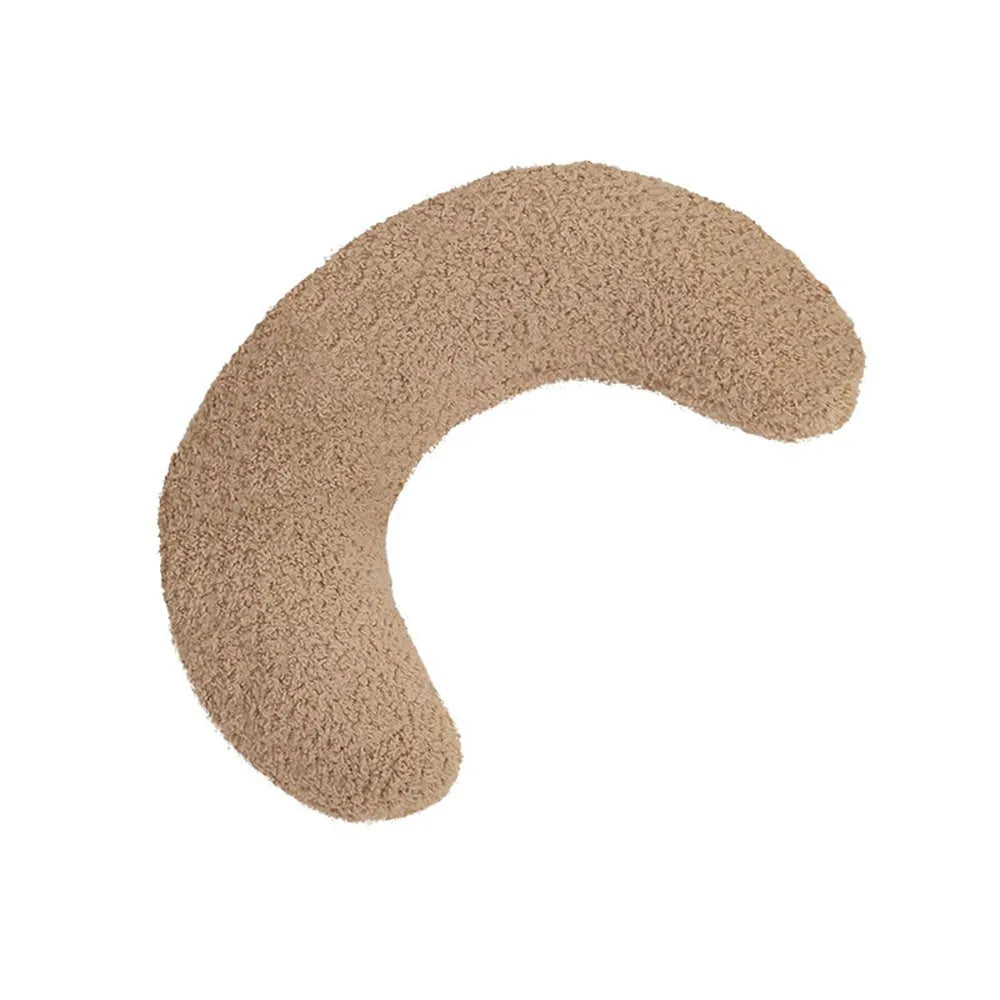 Blue U-shaped cat pillow with an integrated adjustable fabric collar on a grey blanket