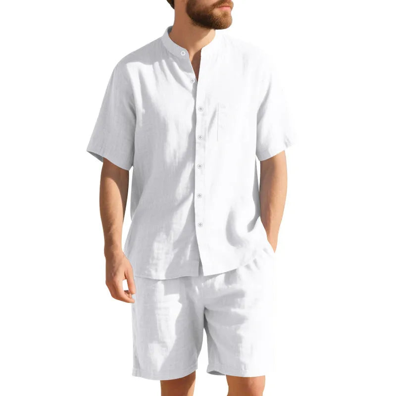 Men's light blue short sleeve linen shirt and shorts two-piece casual suit set on a hanger.
