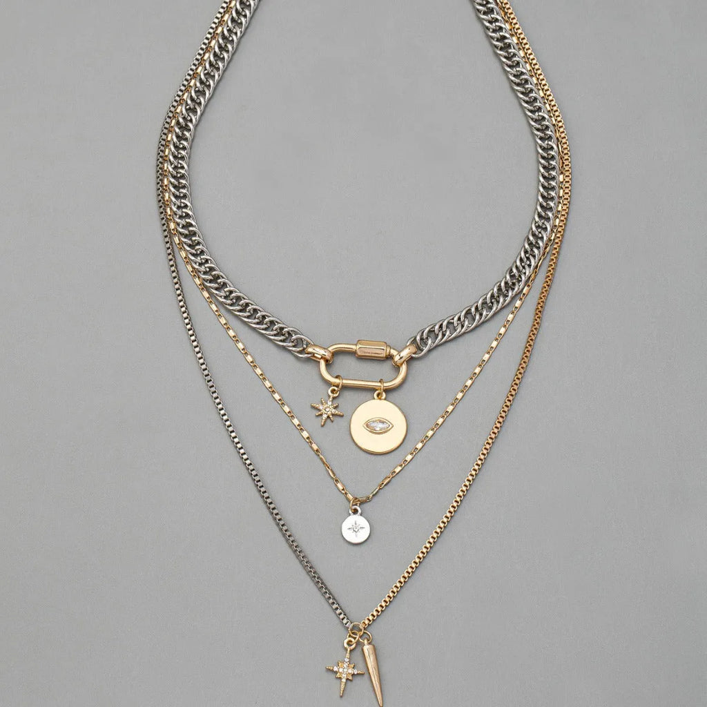 Alloy multi-layer twin necklace with geometric elliptical pendant on a white background