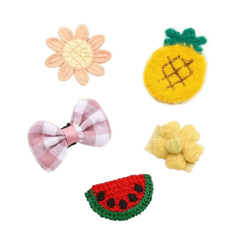 Red and pink plaid plastic cartoon mini dog hairpin sets on a light background