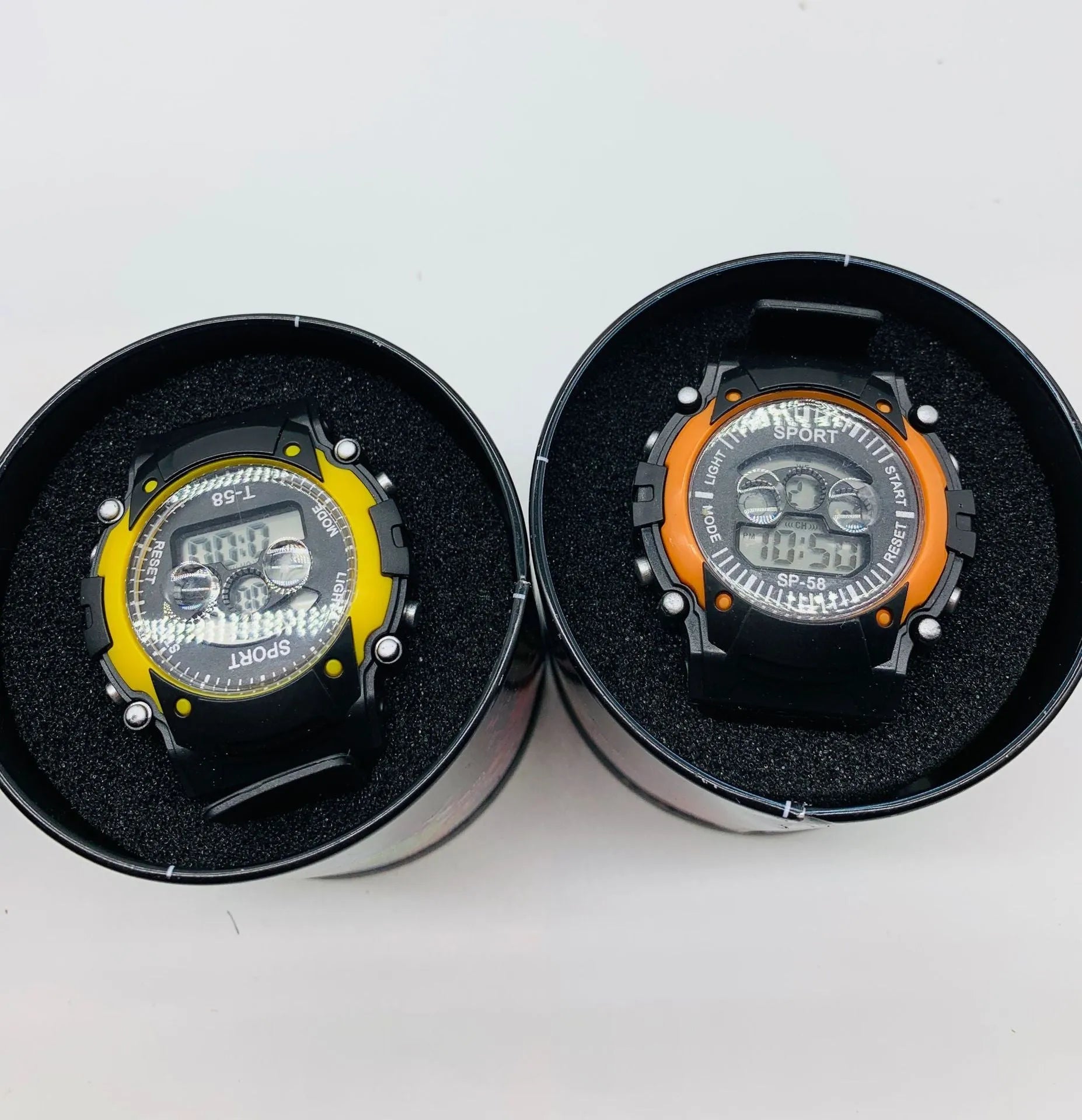 Children's electronic digital sports watch with silicone strap and mixed colour design showing alarm, calendar and countdown functions