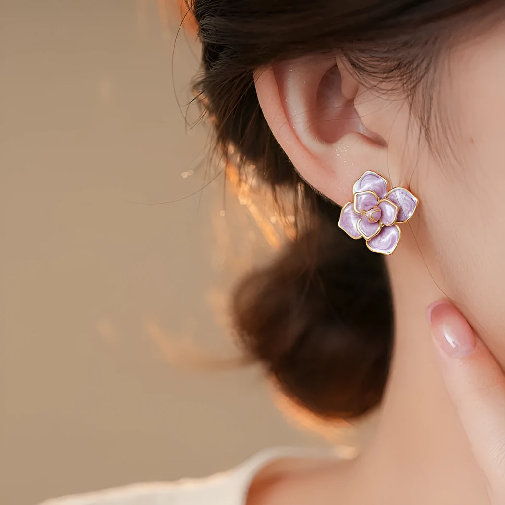 Gold plated purple oil-spot glaze flower stud earrings with fresh floral design and silver needle decoration