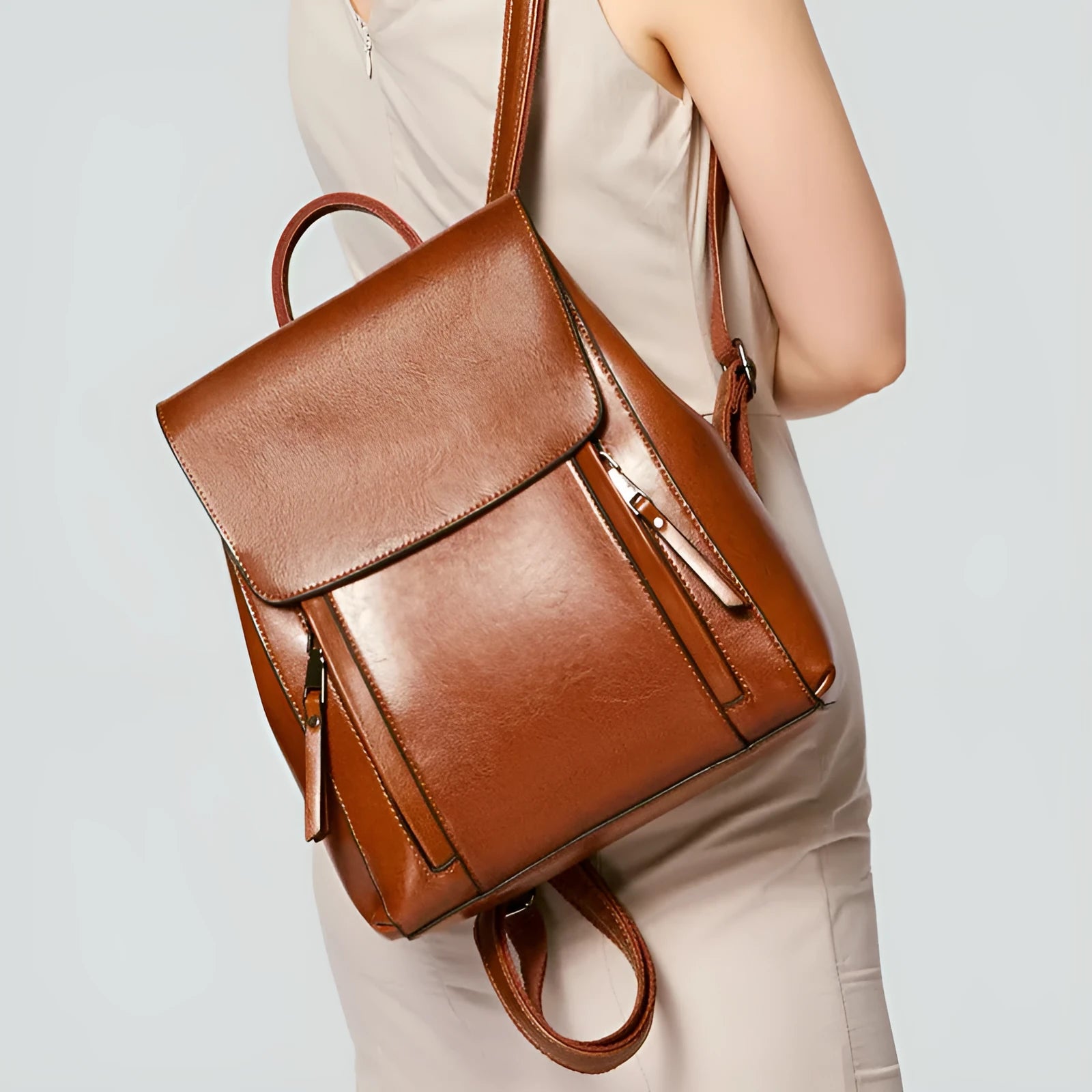 Genuine leather women's backpack in oil-wax cowhide with multiple internal pockets and compartments