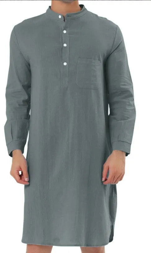 Man wearing a light blue cotton shirt-style robe with front pockets, showcasing casual loungewear.