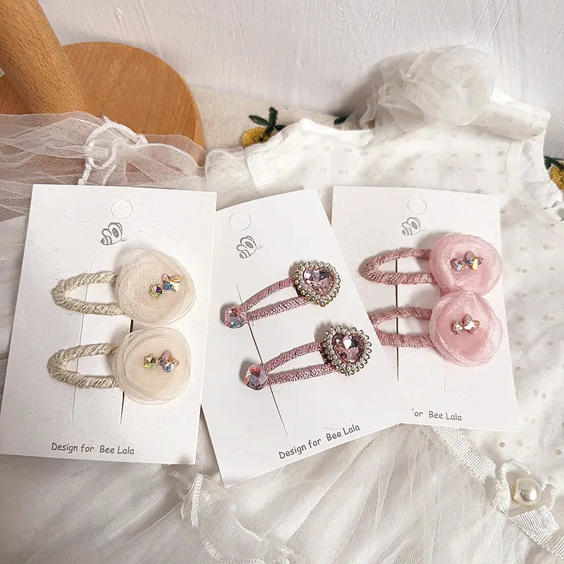 Children's press clip hair accessories set with cloth bows, sequins, pearls, and crystal flowers in pink and beige