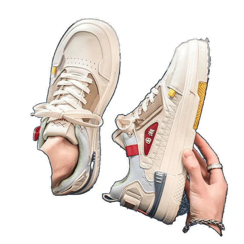 Beige black and beige red low-top white sports sneakers with round toe and lace-up closure