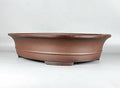 Handmade antique oval bonsai pot in Yixing purple mud, outer dimensions 66cm by 53cm, with a large planting area for pine and cypress