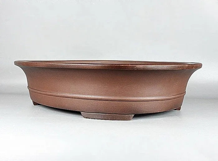 Handmade antique oval bonsai pot in Yixing purple mud, outer dimensions 66cm by 53cm, with a large planting area for pine and cypress