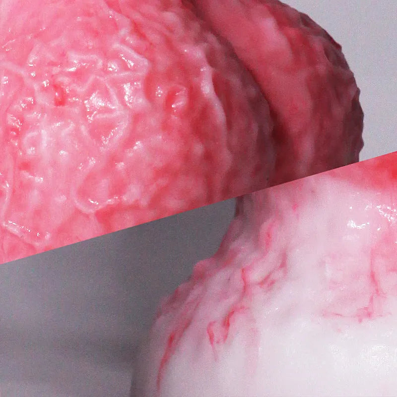 Pink platinum silicone penis-shaped masturbation toy for women, shown with Berserker S and M size options.