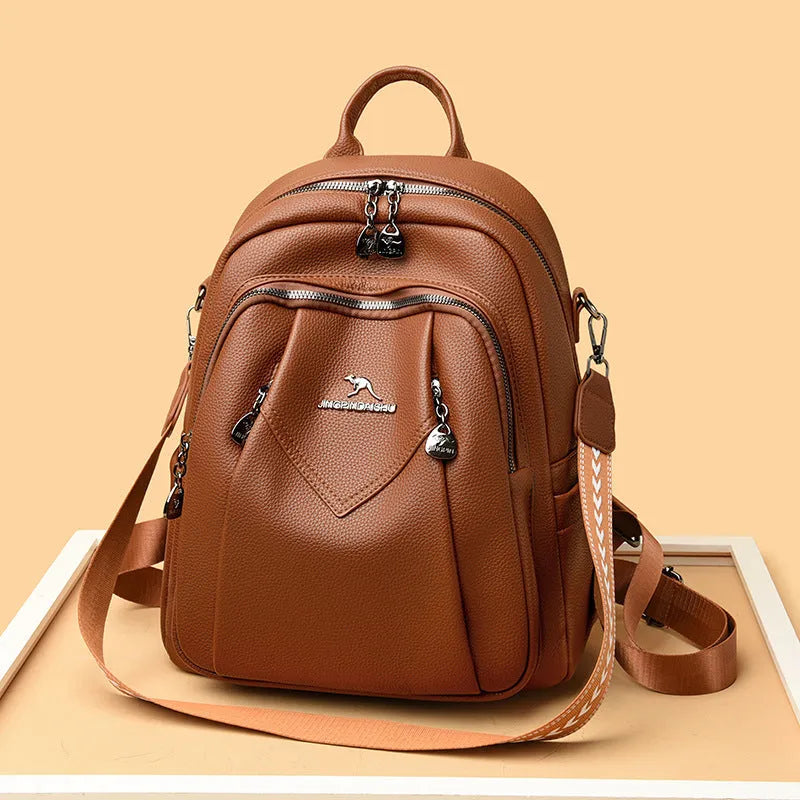 Genuine leather geometric patchwork student backpack with metal belt decoration, waterproof and wear-resistant, in black beige and yellow