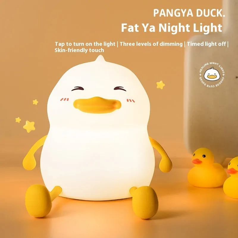 Chubby creative night lamp with phone holder function in silicone and plastic construction