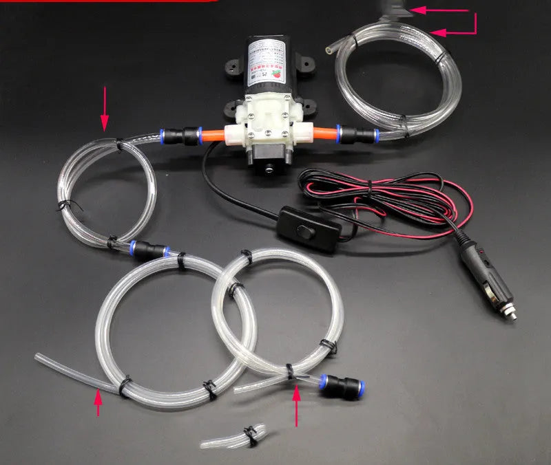 Self-priming electric oil changer with cigarette lighter plug and fish clip steel pipe