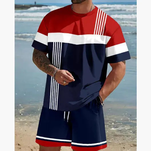 Man wearing a loose blue short-sleeved t-shirt and matching shorts from a summer leisure set.
