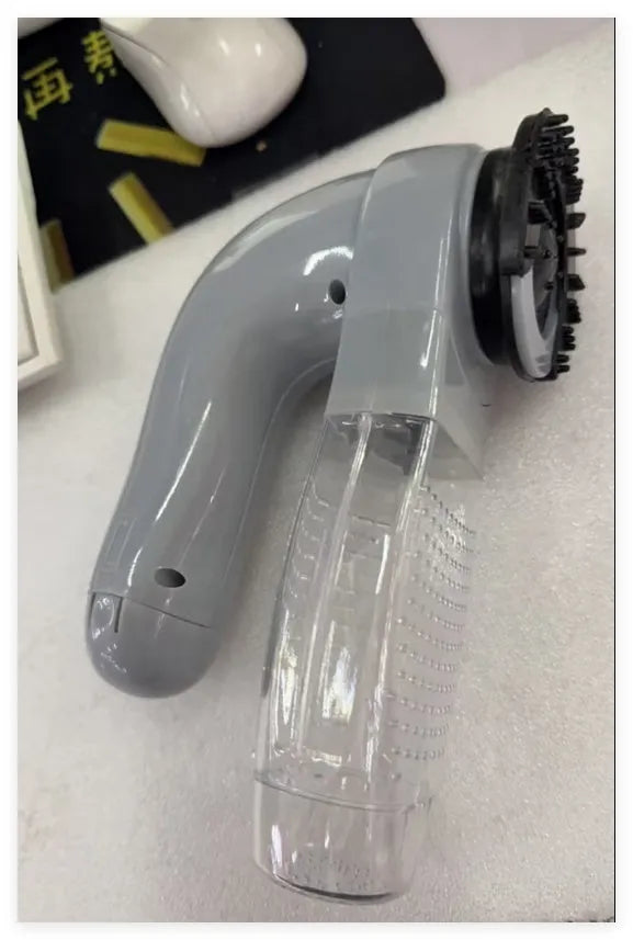 Grey portable electric pet hair vacuum cleaner with soft rubber brush head for dogs and cats