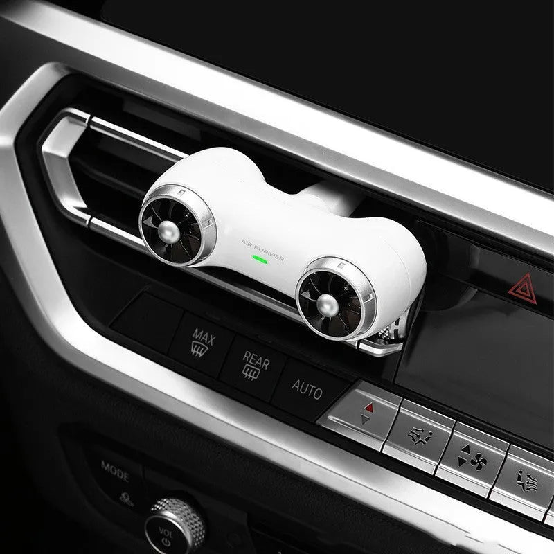 Car Mute Anion Purifier Aromatherapy black unit on vehicle dashboard with Type-C cable