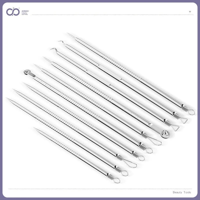 Four silver metal acne needles with ultra-fine pointed tips for skin treatment.