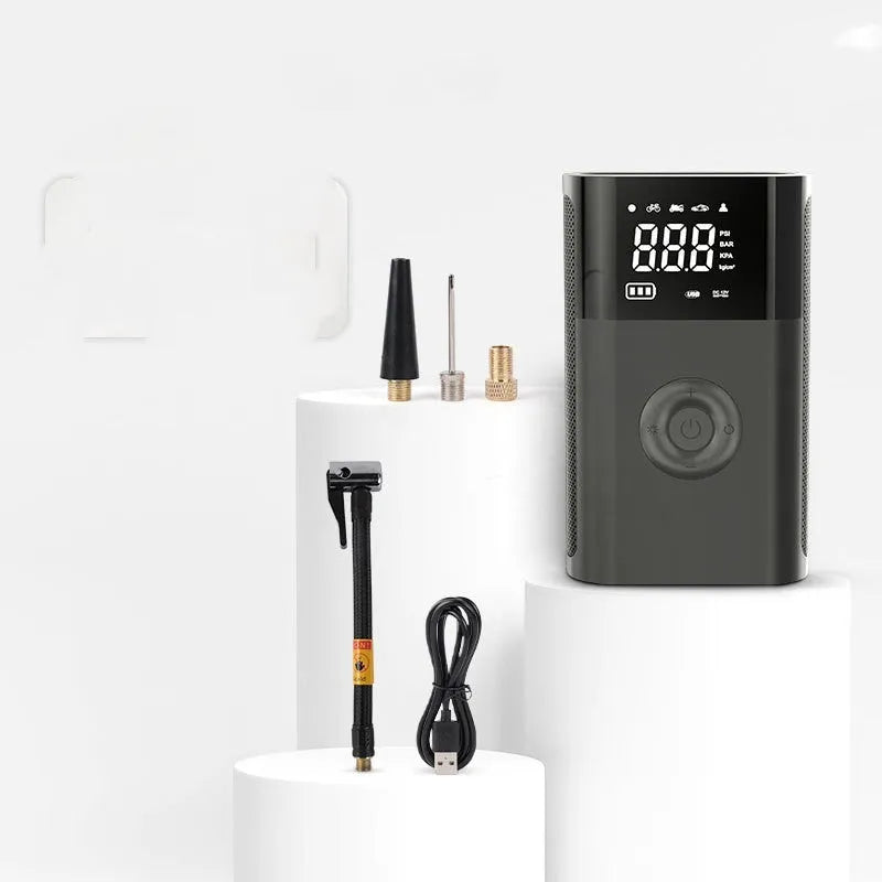 Wireless handheld digital tyre inflator with LCD screen, LED light, and attachments for car, bike, and ball valves.