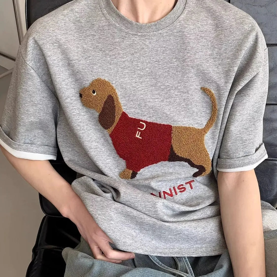 Men's grey cotton t-shirt with embroidered sausage dog design on the chest