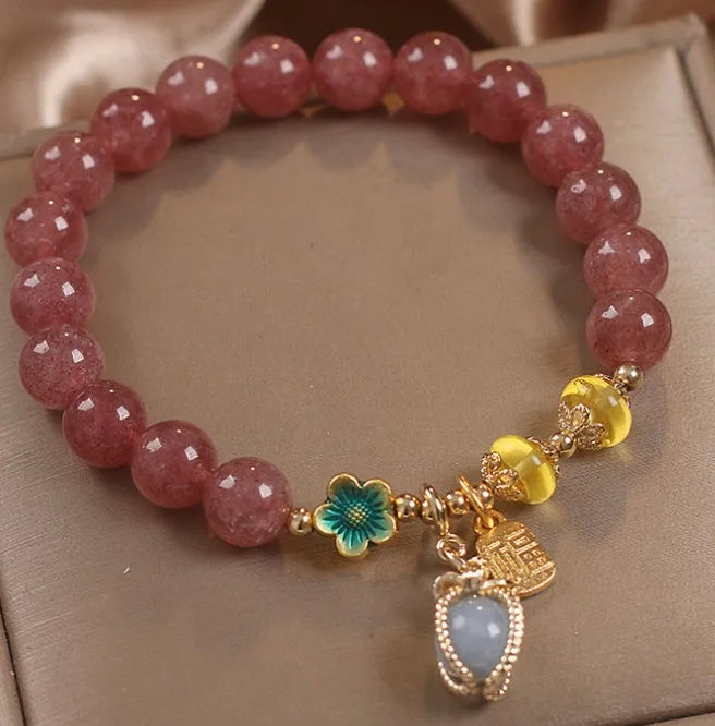 Red strawberry quartz beaded bracelet with alloy components and rhinestone accents for women