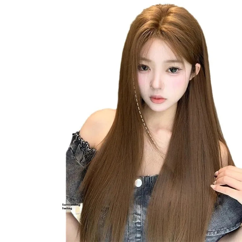 Warm brown long straight wig with centre-parted bangs and a white forehead lace front.