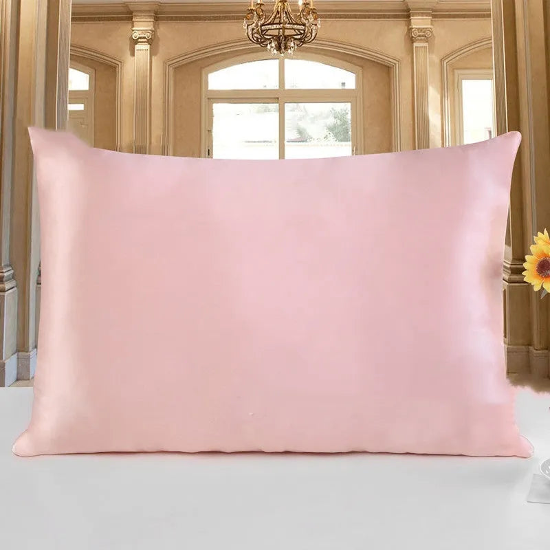 Double-sided silk pillowcase in apricot colour showing smooth satin weave texture.
