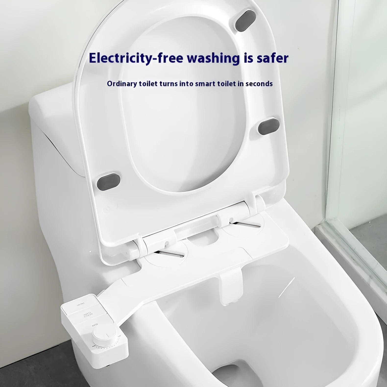 Pure white button-operated wash tool with detachable nozzle and multiple plumbing fittings